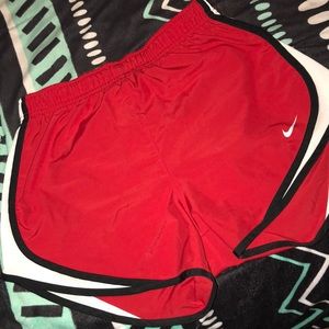 Red nike shorts